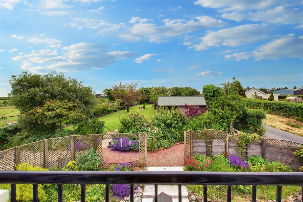 Views overlooking garden from bedroom 1