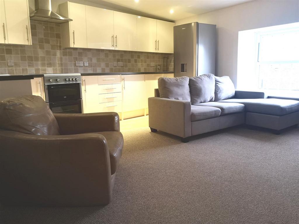 Open plan lounge/kitchen