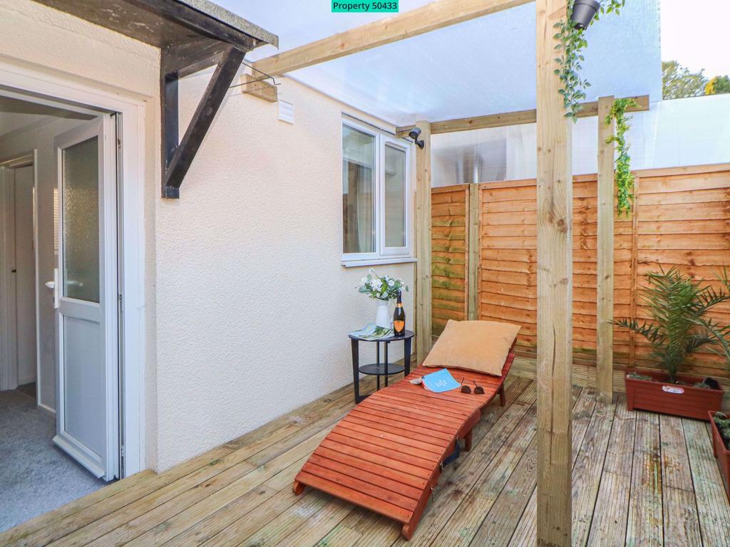 Back garden fully decked and fenced