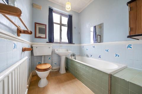 27 Abbott Avenue, London, SW20 8SG