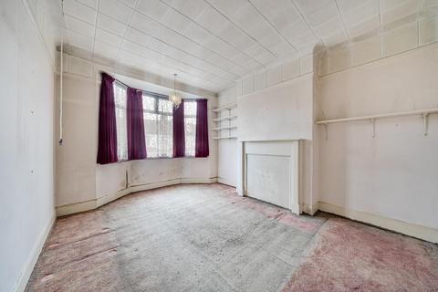 27 Abbott Avenue, London, SW20 8SG