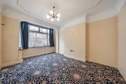 27 Abbott Avenue, London, SW20 8SG