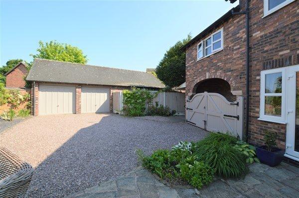 Gated parking area &amp; double garage