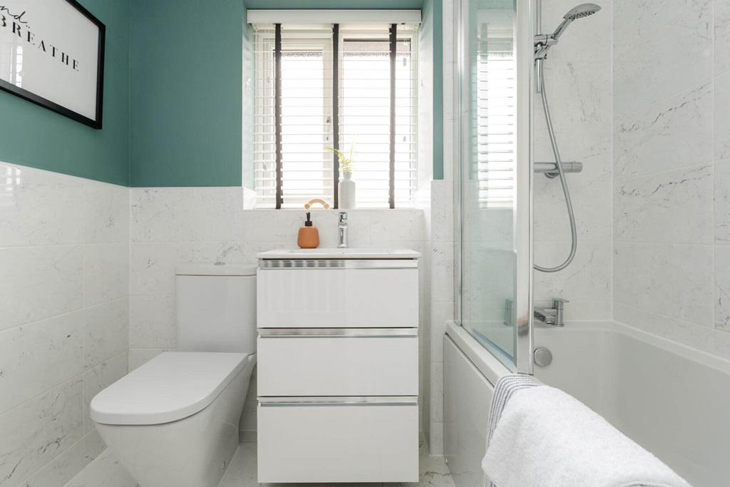 A family bathroom completes the home