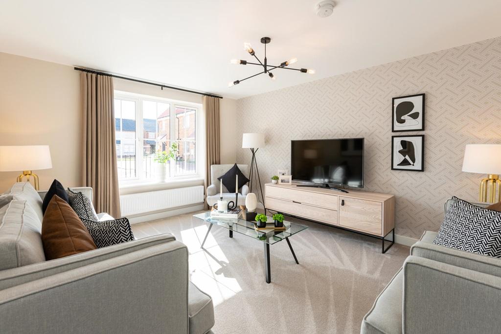 A bright and spacious lounge sits at the front...