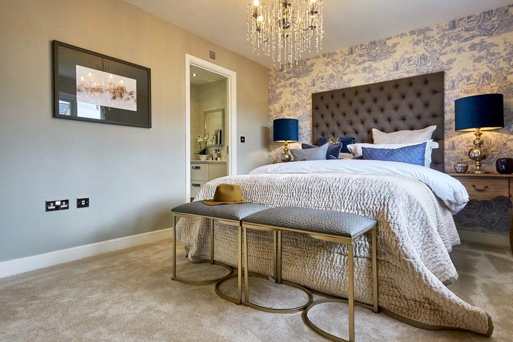 An impressive main bedroom with en suite