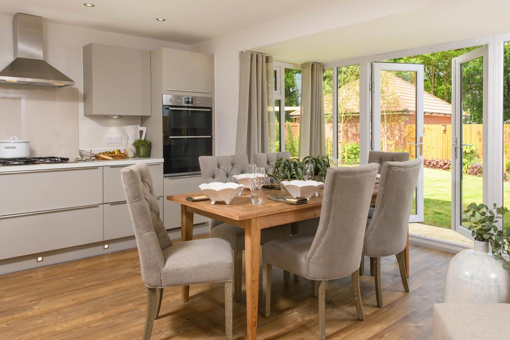 Open plan kitchen with integrated appliances,...