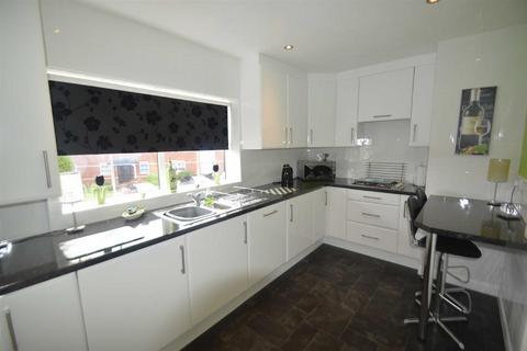 41 Bishopton Drive, Macclesfield, SK11 8TS