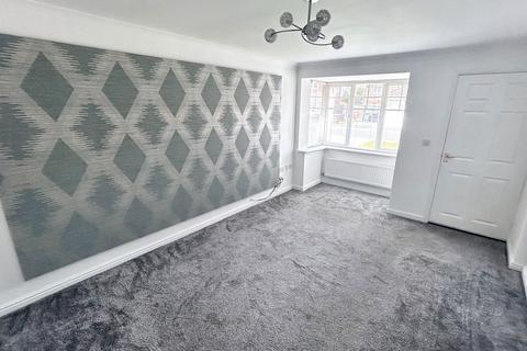 13 Rothbury Drive, Ashington, NE63 8TJ