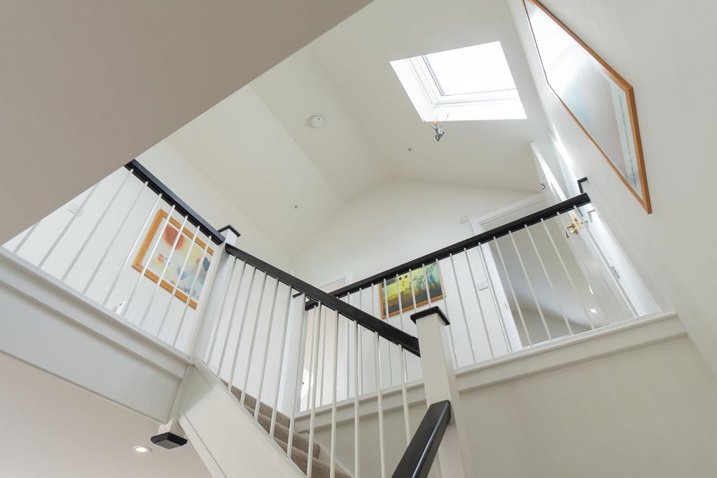 Winding staircase and galleried landing