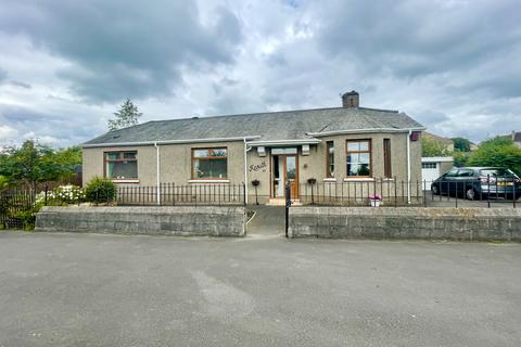 Airdrie - 4 bedroom detached bungalow for sale