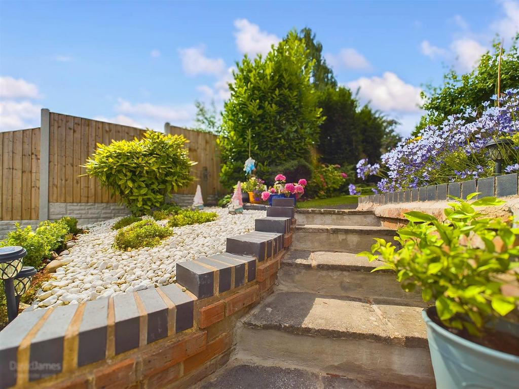 Rear Garden steps up to elevated garden