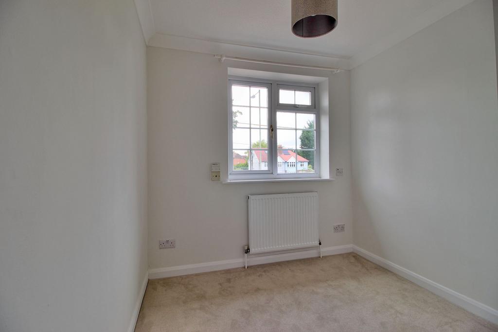 Bedroom Four with large cupboard over stairwell