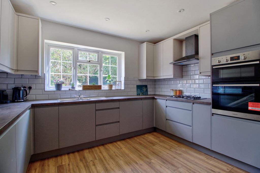 Newly-fitted kitchen with appliances