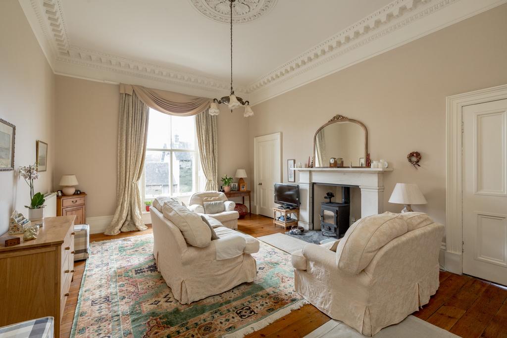 Elegant drawingroom with wood burning stove