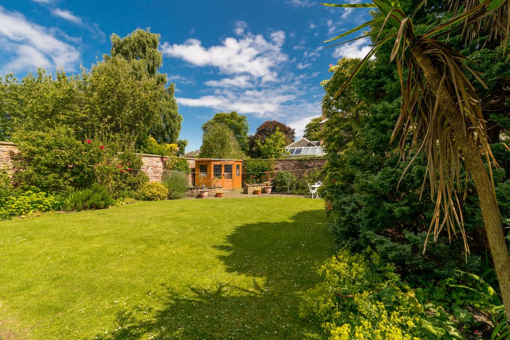 Beautiful mature lawned garden