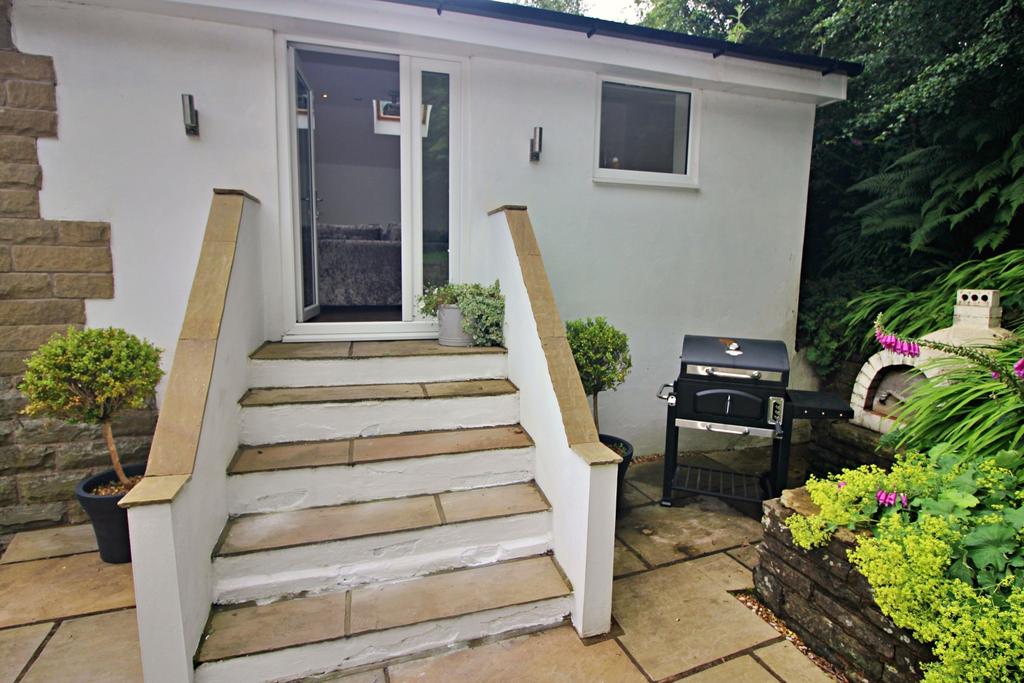 Entrance with Adjacent Pizza Oven