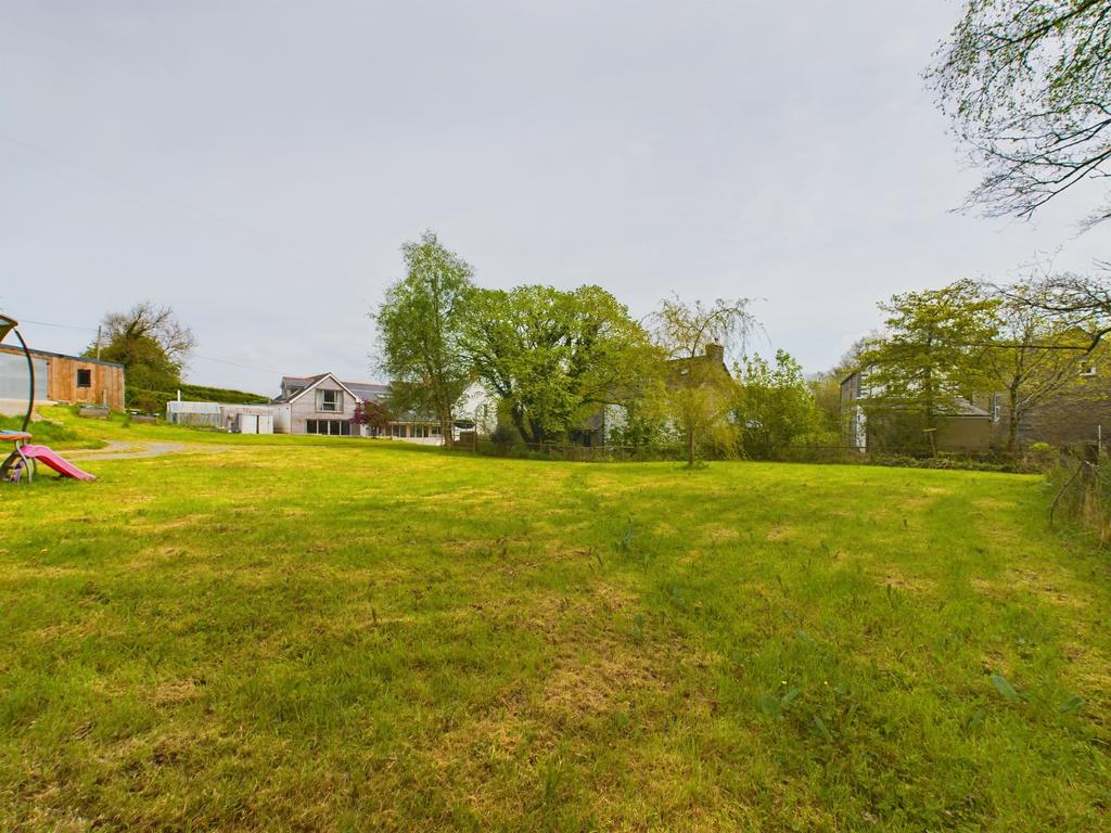 To Front & Side Garden Area
