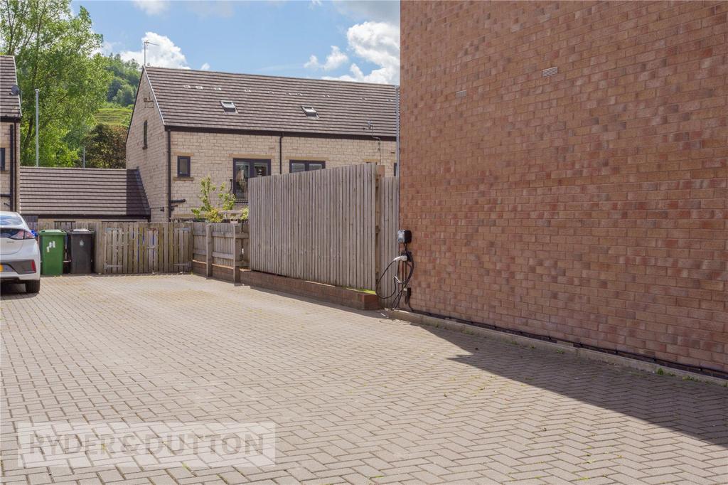 Driveway To Side.