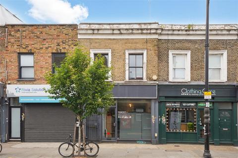 Retail property (high street) for sale, Roman Road, London E3