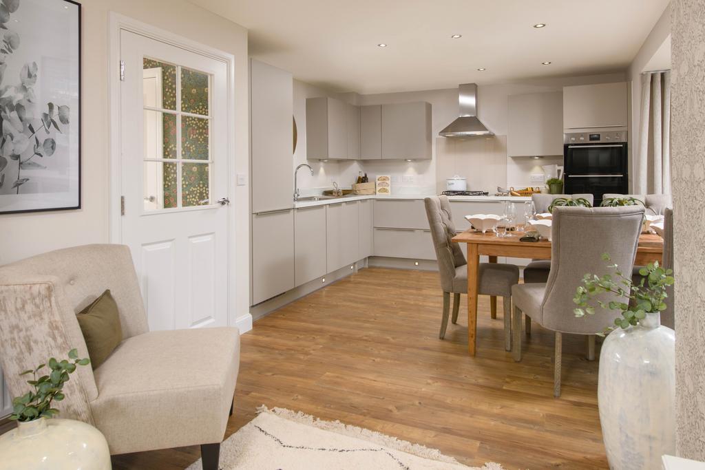 Open plan kitchen with integrated appliances,...