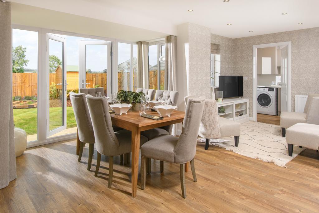 Open-plan kitchen with integrated appliances,...