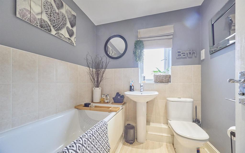 Family bathroom to rear