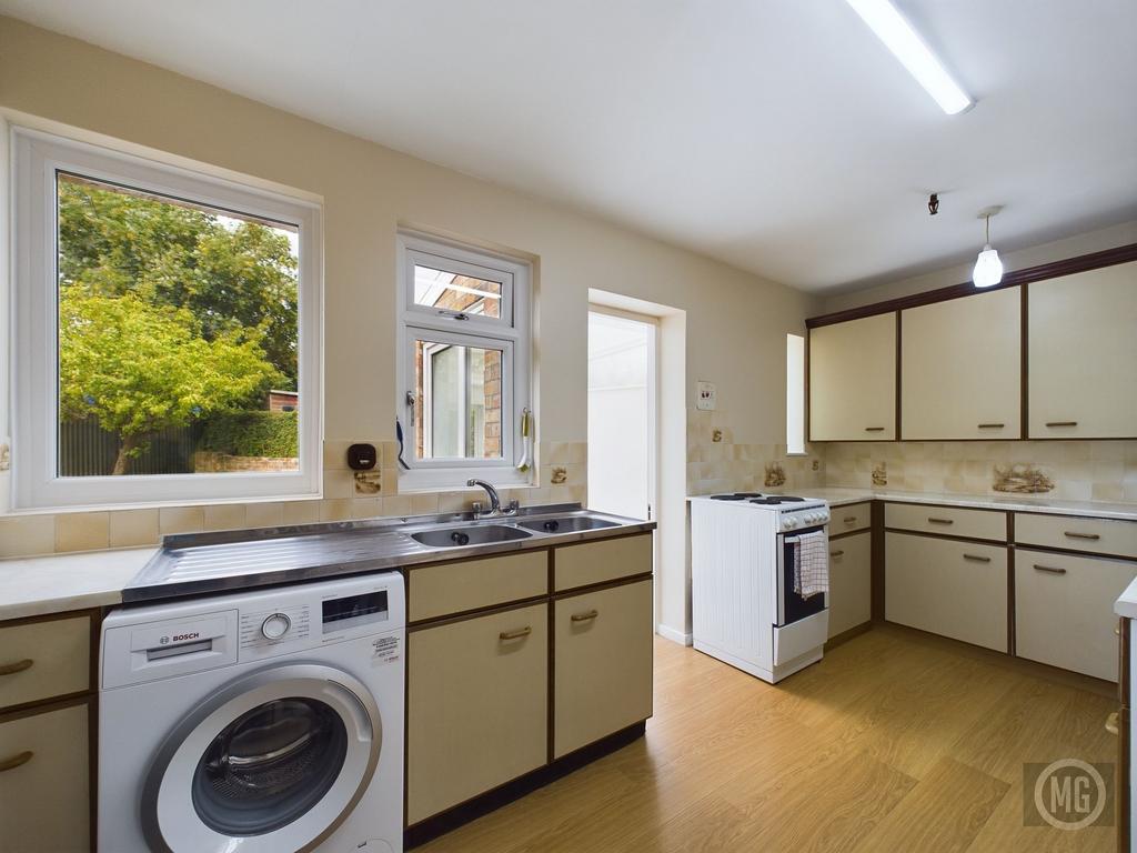 Kitchen leading into Sun Room