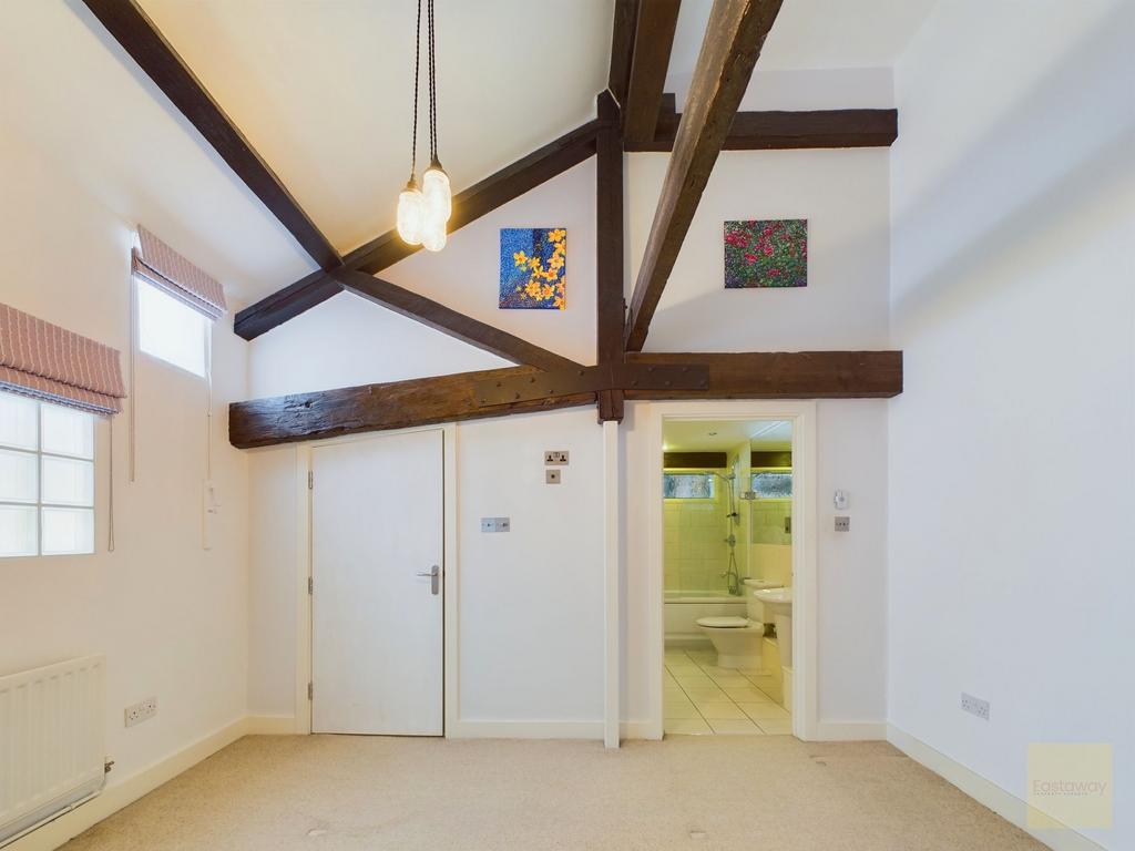 Bedroom with original beams