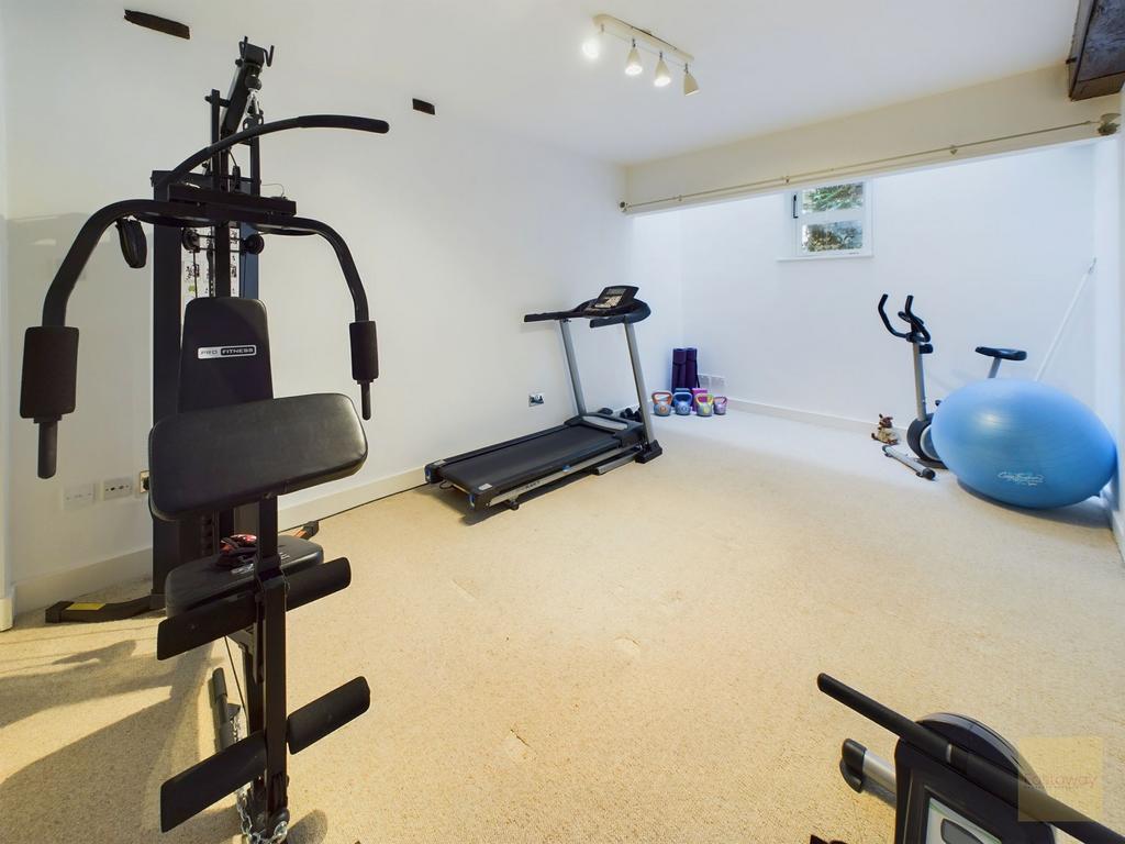 Bedroom currently used as a home gym