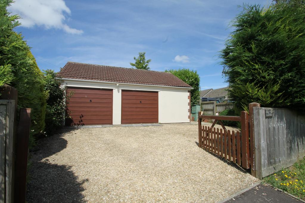 Double garage, workshop and parking