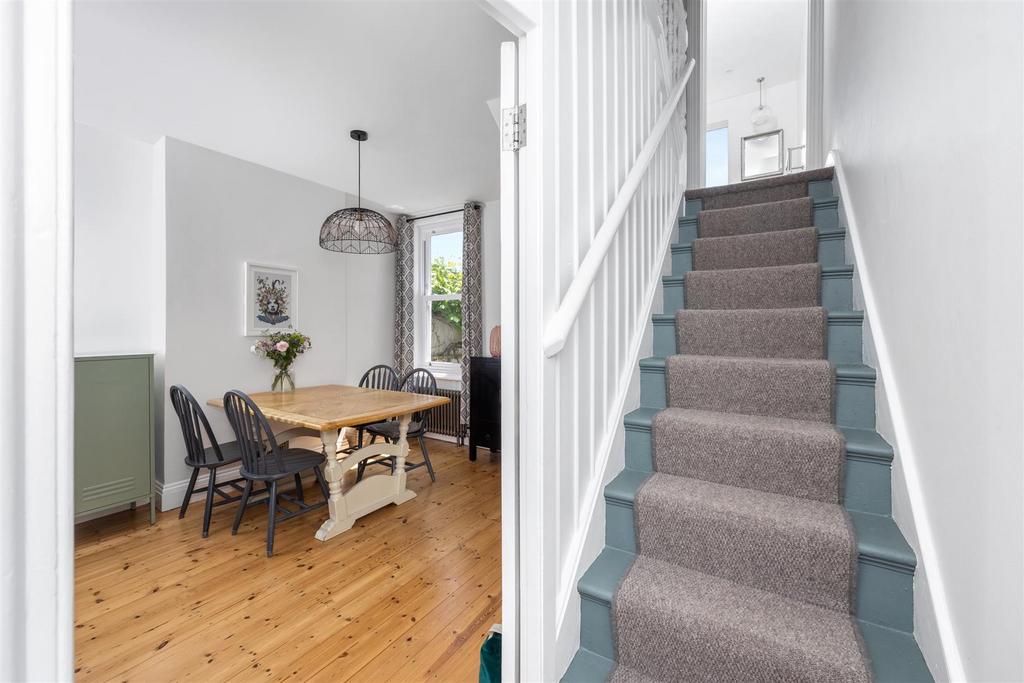 Stairs rising to First Floor