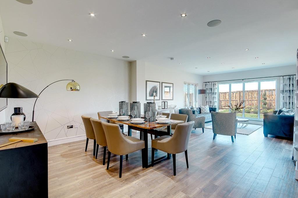 The bright garden room offers a superb social...