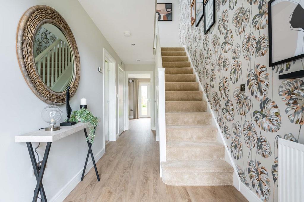 The light &amp; airy entrance hall with hidden storage