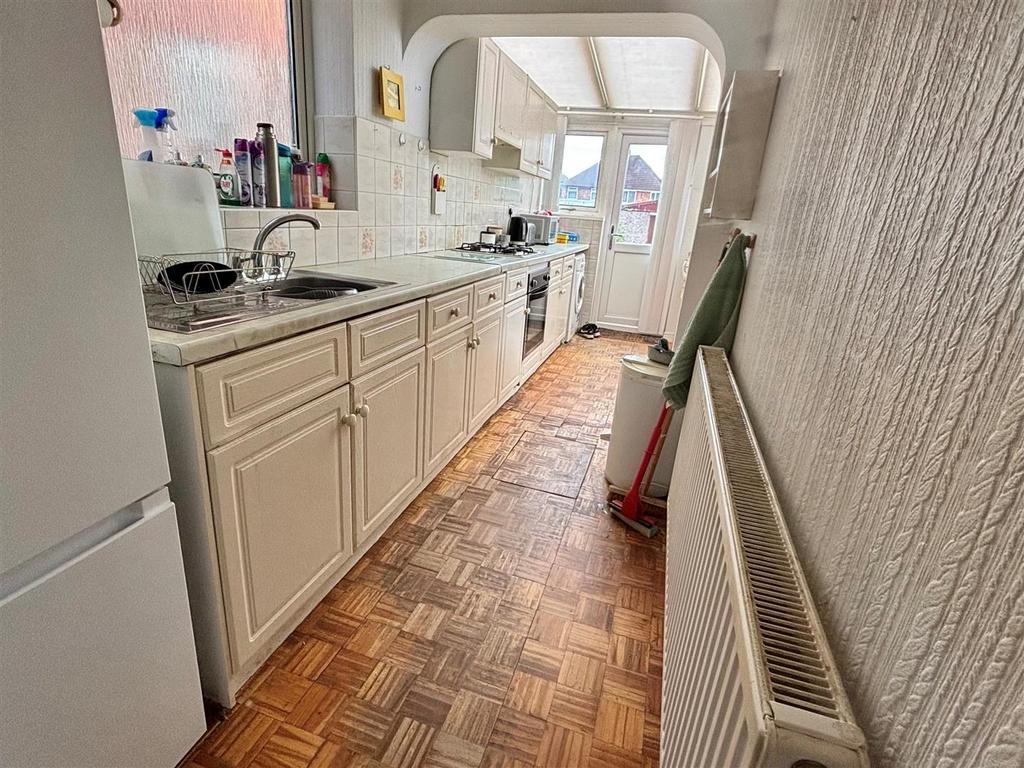 Kitchen and conservatory area