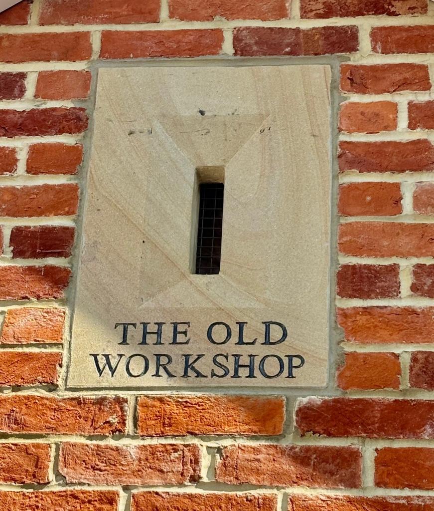 Old workshop plaque