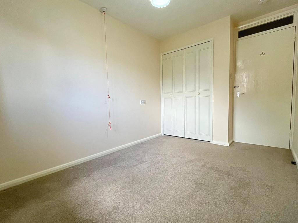 Bed 1 to wardrobe