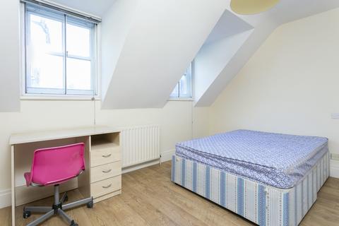 4 bedroom terraced house to rent, Chenies Mews, London WC1E