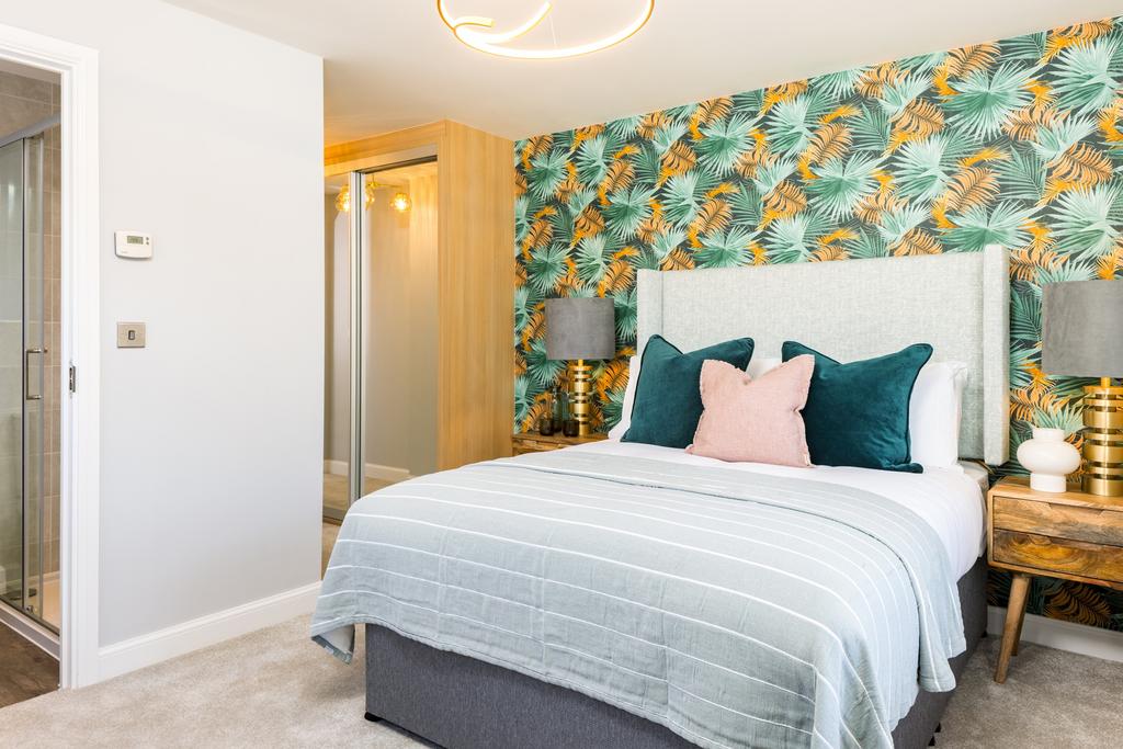 Main bedroom with green and yellow wallpaper