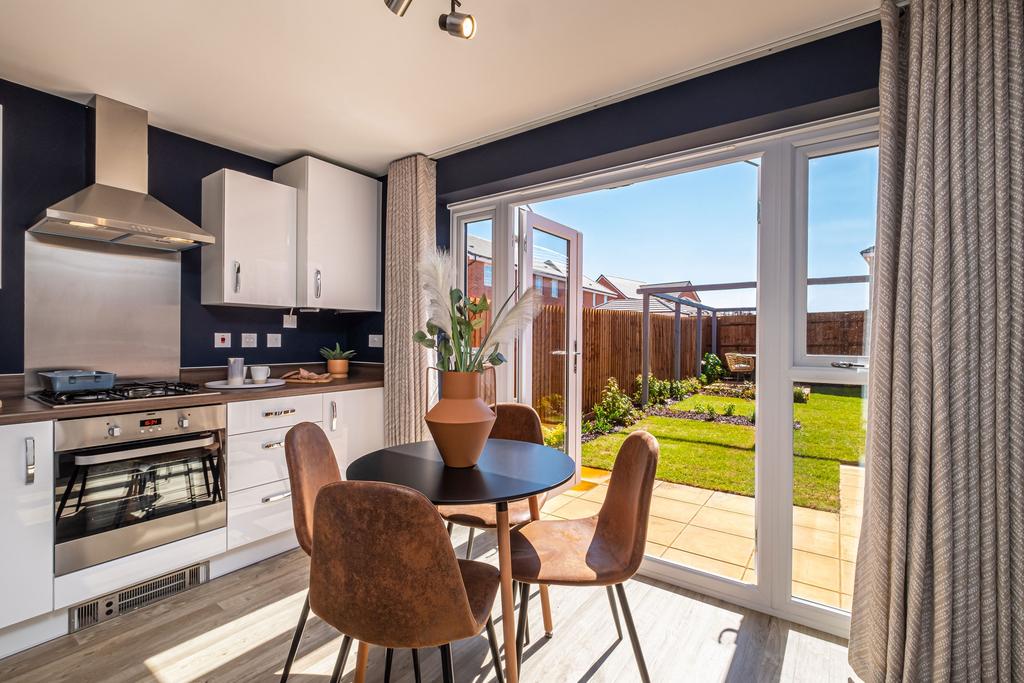 Interior view of the kitchen &amp; dining space in...