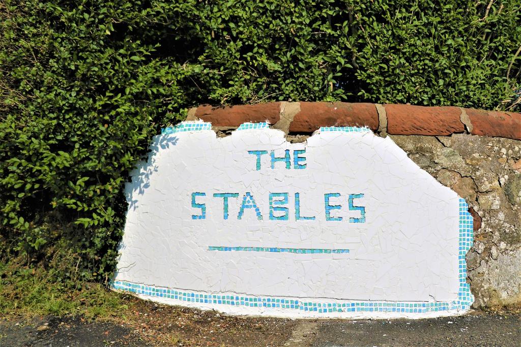 Sign at bottom of driveway