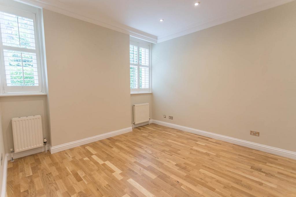 Bedroom 2 with wardrobes