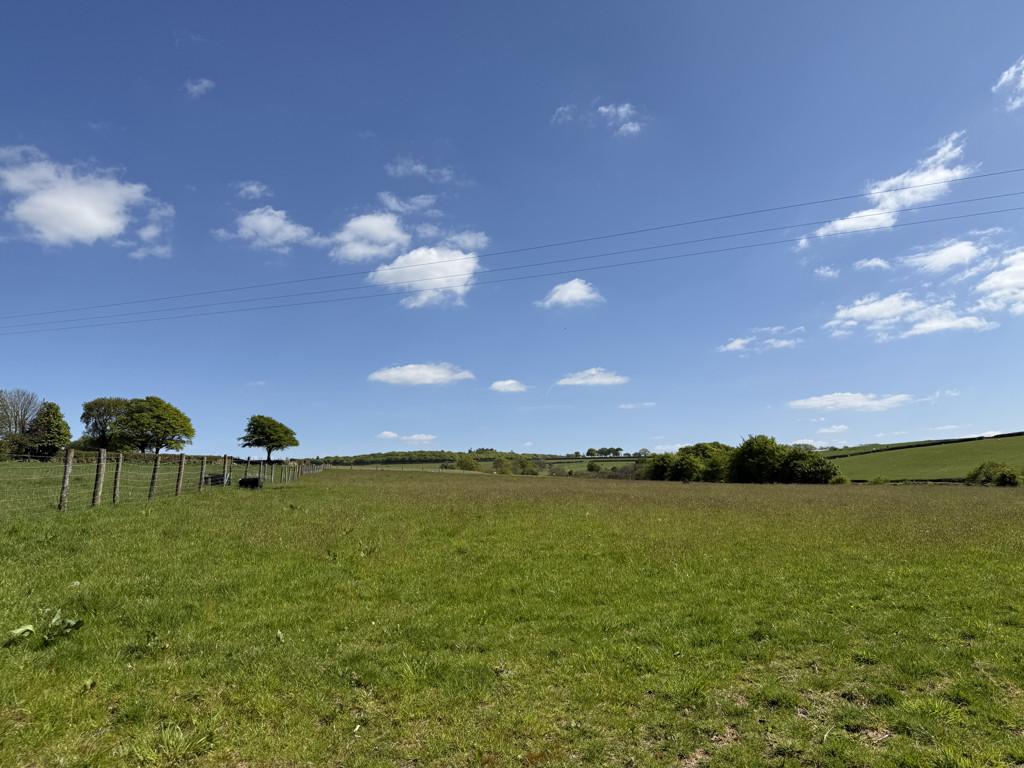 Adjacent Land
