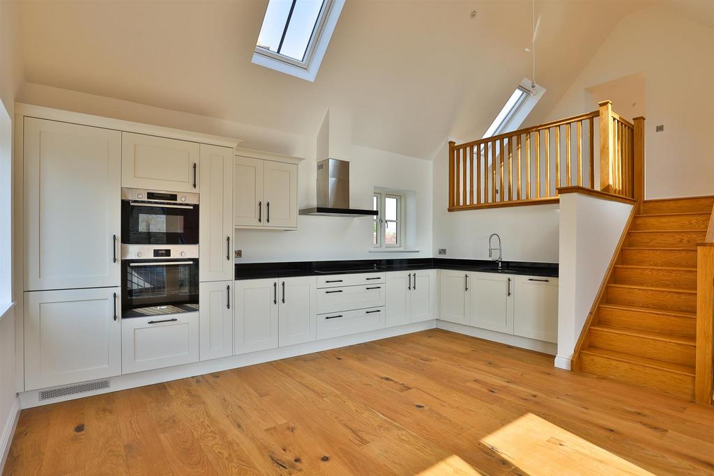 Kitchen/Dinning Room Leading To Living Space