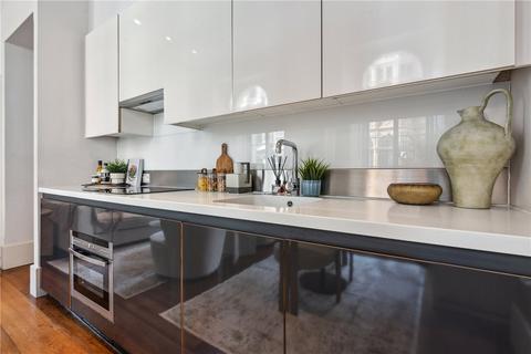 Flat 1, 50 Maddox Street, London, W1S 1AY