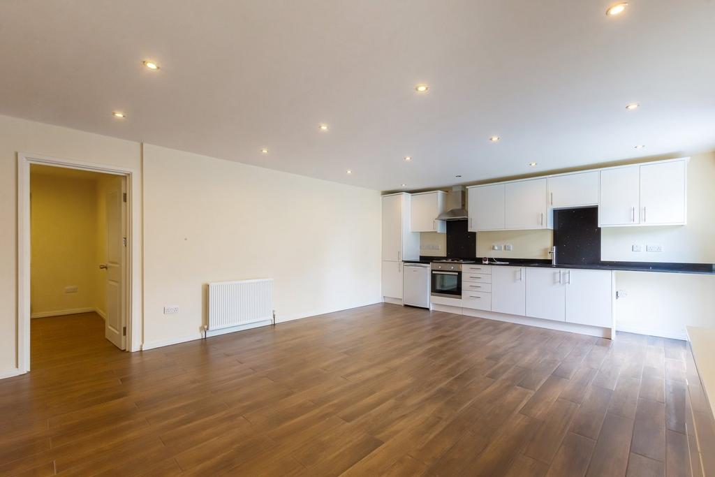 Flat Lounge Open To Kitchen