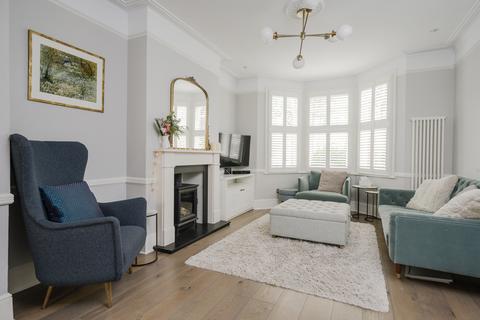 10 Boscombe Road, London, SW19 3AX