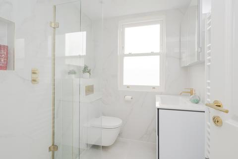 10 Boscombe Road, London, SW19 3AX