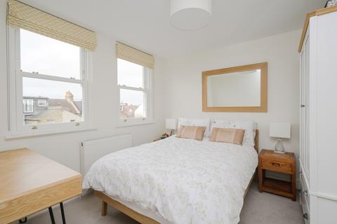 10 Boscombe Road, London, SW19 3AX