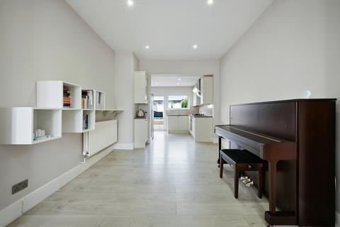 66 Faraday Road, London, SW19 8PD